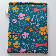 Load image into Gallery viewer, Paw Prints - Padded Book Sleeve